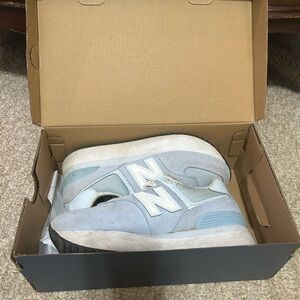Baby Blue New Balance 574 Sneakers